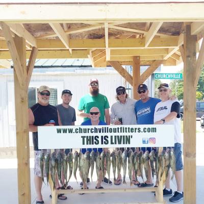 Charter guests with their catch of the day
